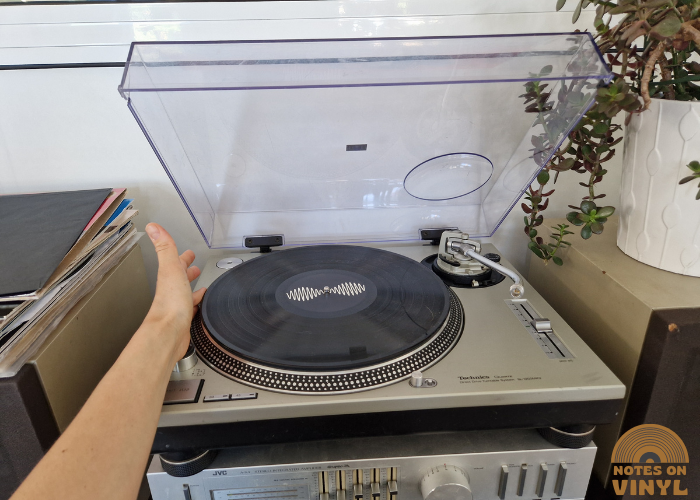 how to handle a vinyl record aligned with the spindle