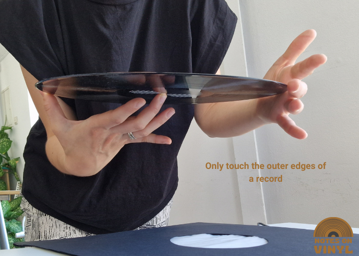 how to take vinyl out of sleeve